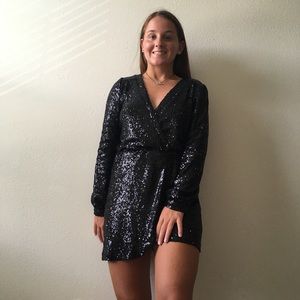 Black sequined asymmetrical mini dress